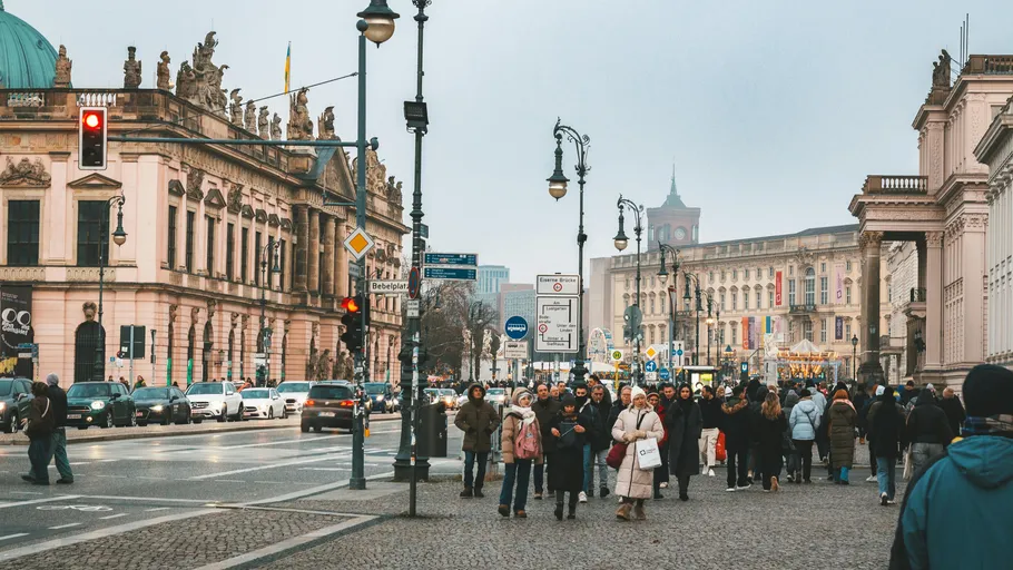 People walking on busy city street.