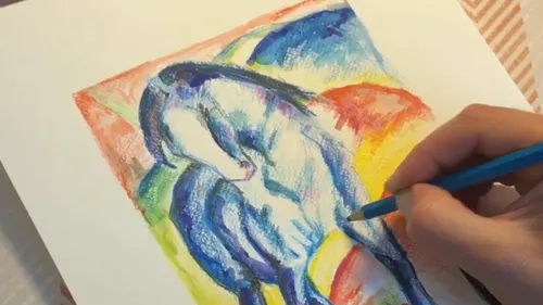 Hand drawing colorful horse on paper.