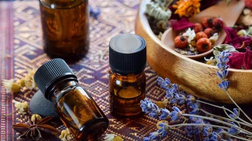 Essential oils on cloth with herbs.