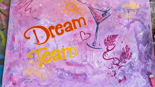 Colorful artwork with 'Dream Team' text.