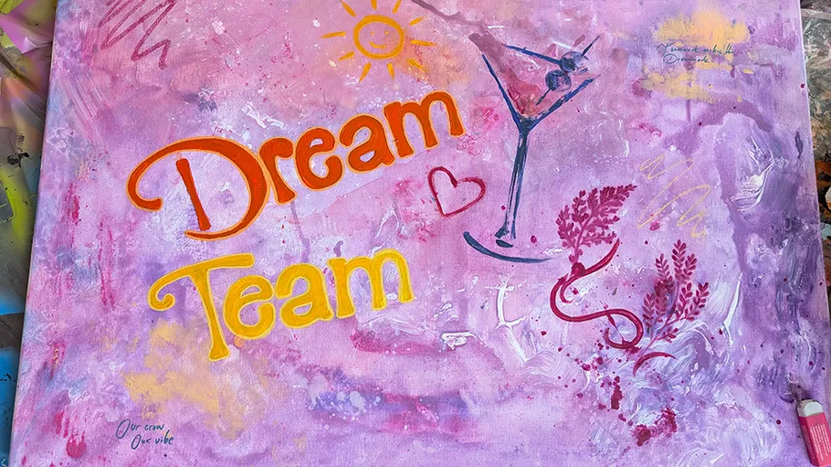 Colorful artwork with 'Dream Team' text.