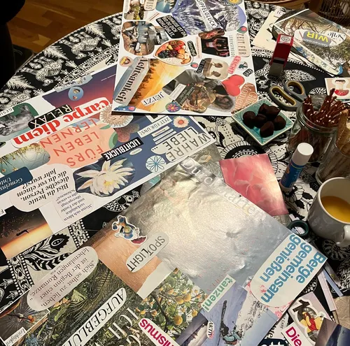 Collage materials on patterned table.