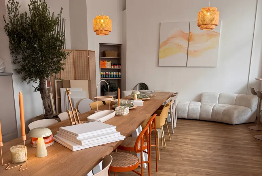 Dining table with chairs in modern room.