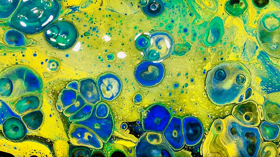 Abstract painting with blue and yellow cells.
