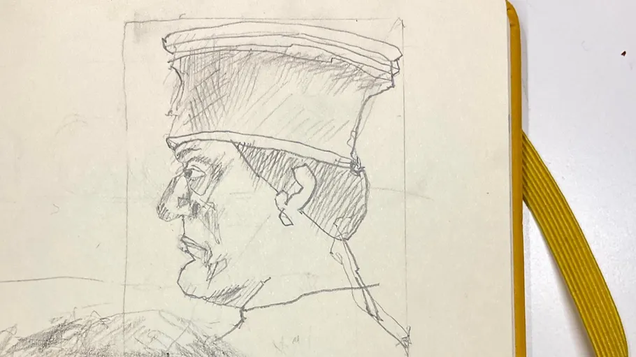 Sketch of a man in a hat.