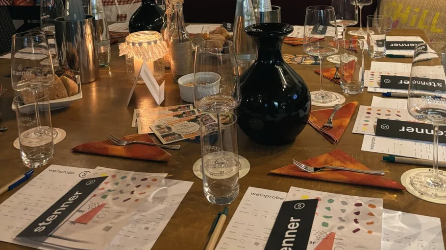 Table set for wine tasting with menus.