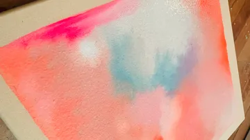 Colorful abstract watercolor on canvas surface.