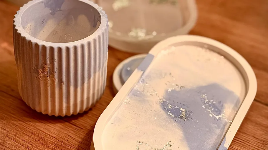 Ceramic tray and cup on wooden table.