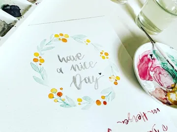 Colourful watercolor painting with the text 'Have a Nice Day'