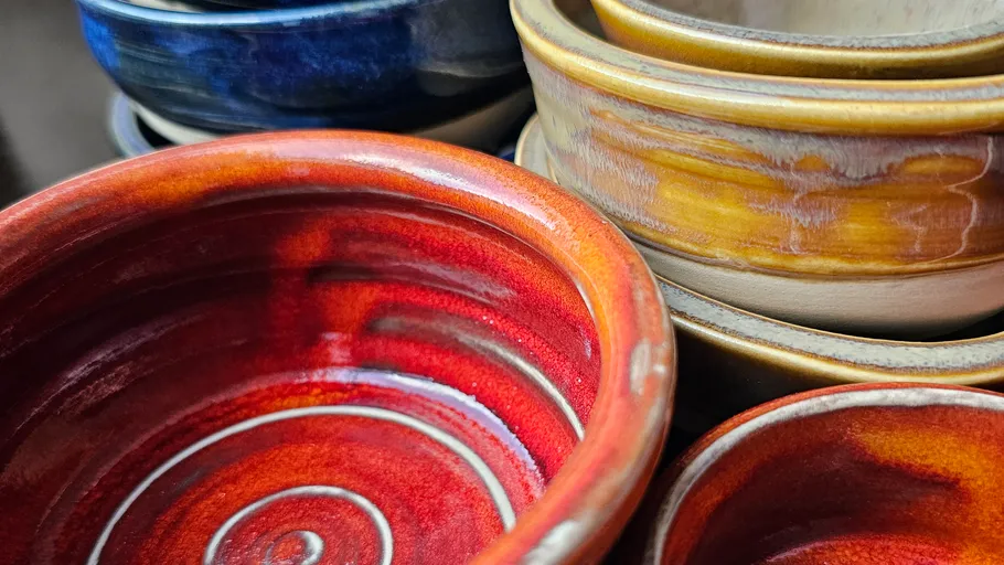 Colorful ceramic bowls stacked together.