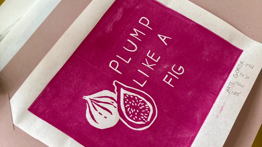 Pink print with fig and English text.