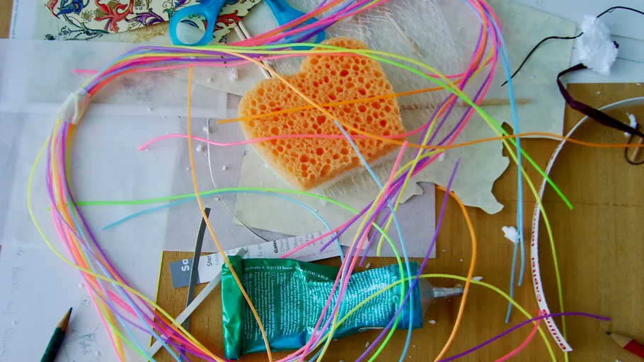 Crafting materials scattered on a table.