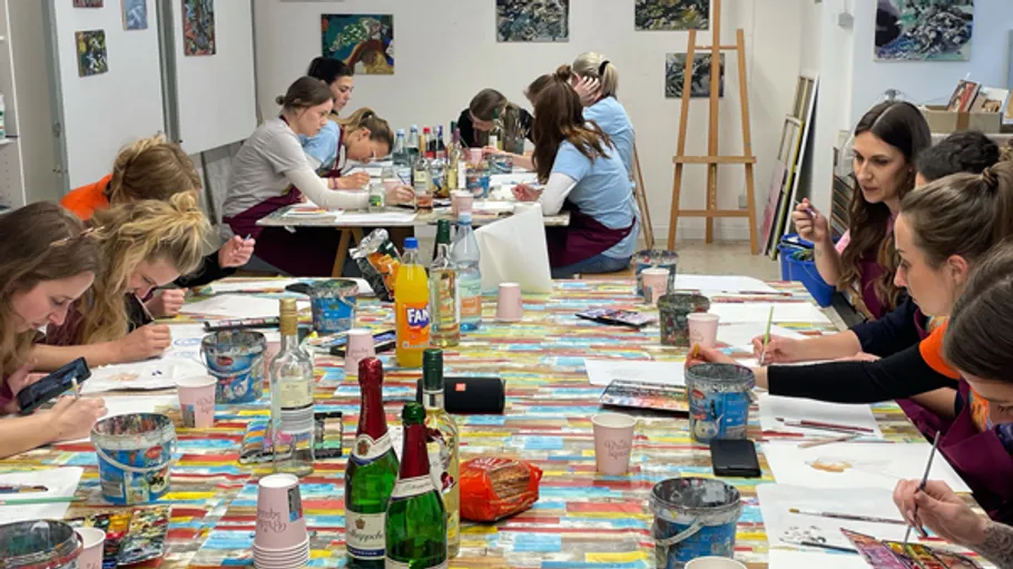 Group painting in an art studio.