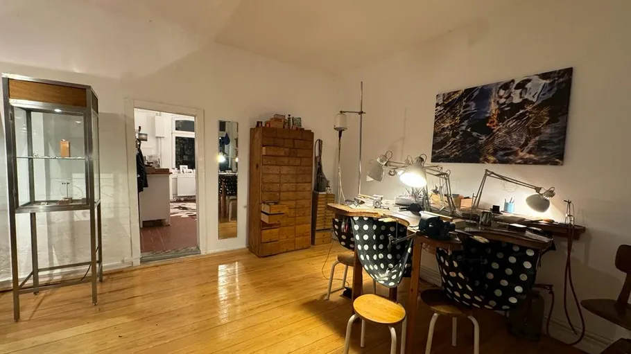 Home office with two desks and chairs.