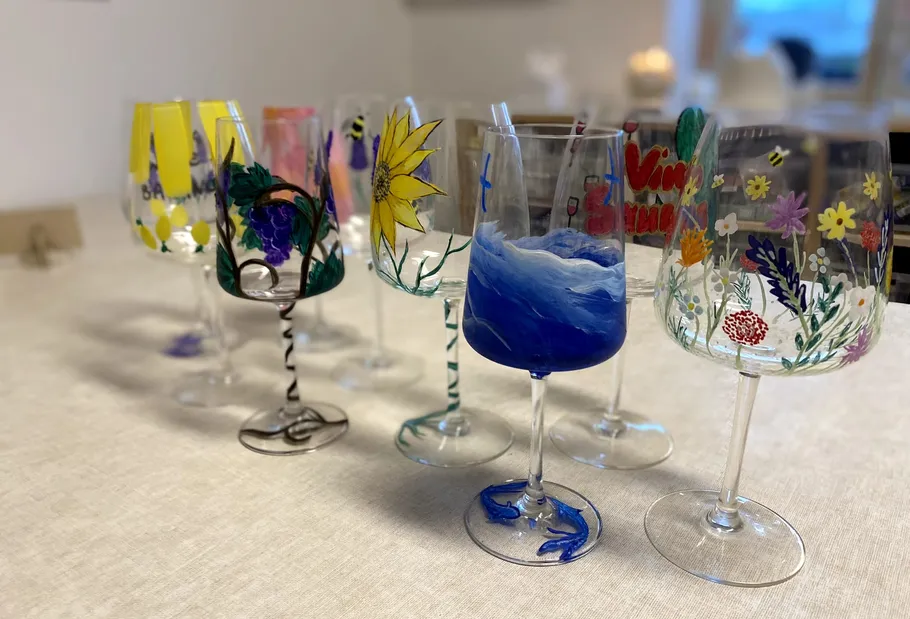 Painted wine glasses on a table.