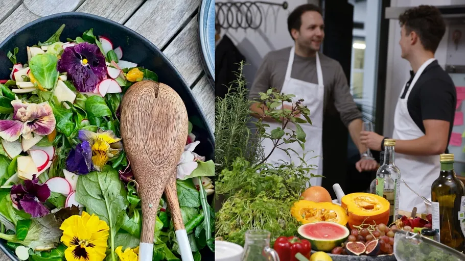 Salad with flowers and two people cooking.