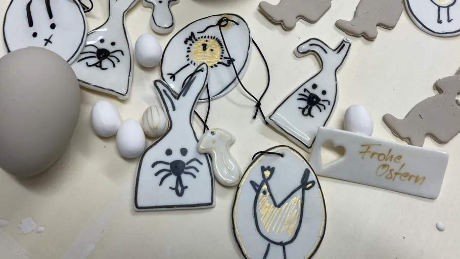 Easter clay decorations with rabbit and egg shapes.
