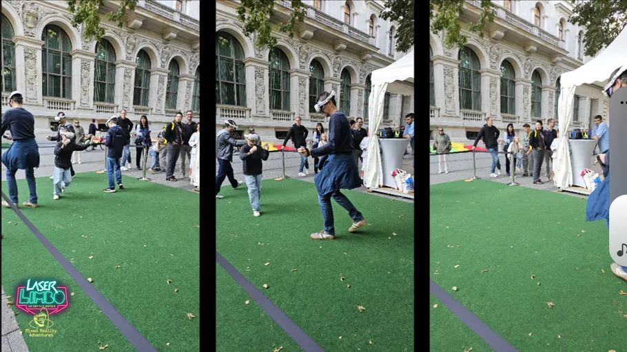 People playing laser game outdoors on green mat.