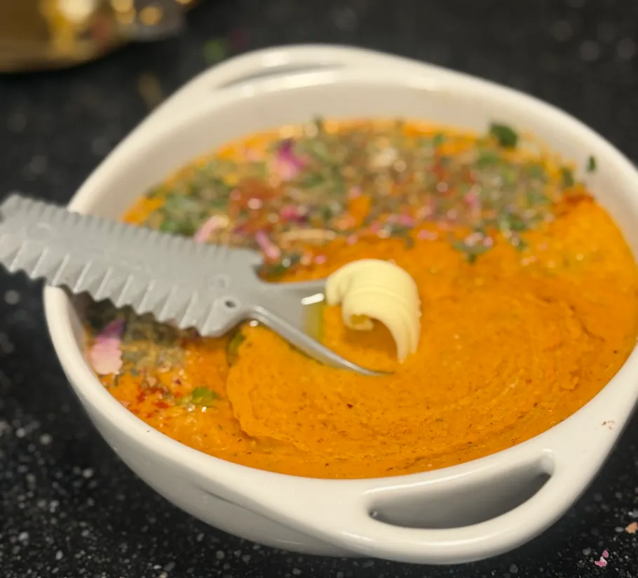 Creamy dish with herbs and butter swirl.