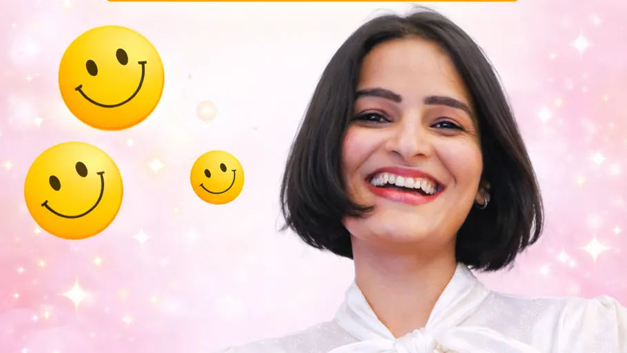 Smiling woman with yellow smiley faces.