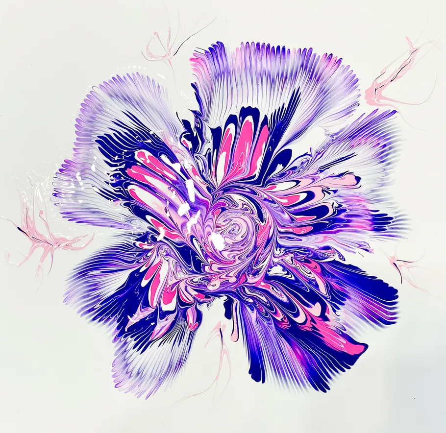 Colorful abstract flower-like pattern on white background.
