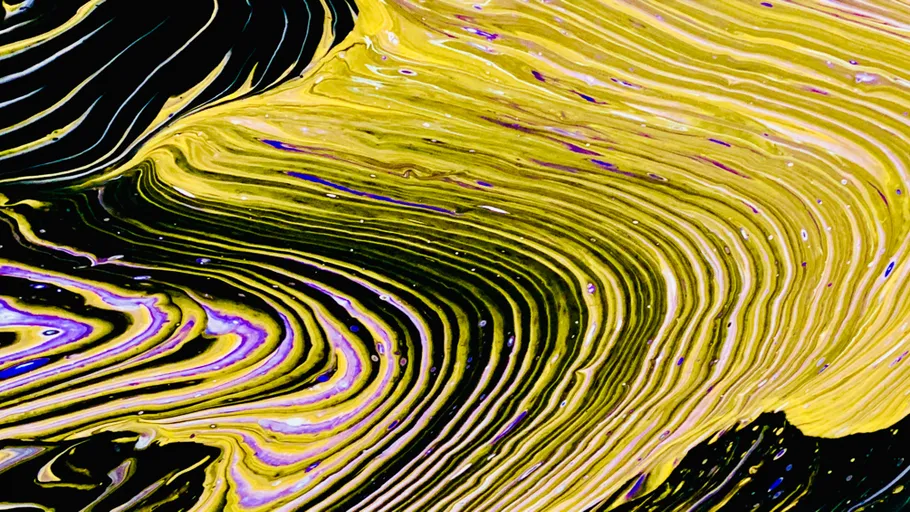 Yellow and black swirled abstract pattern.