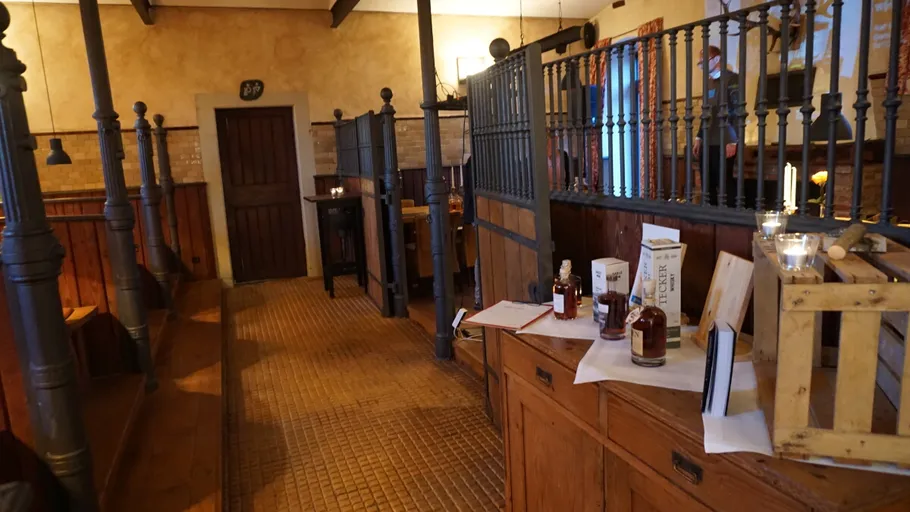 Traditional pub interior with wooden tables.