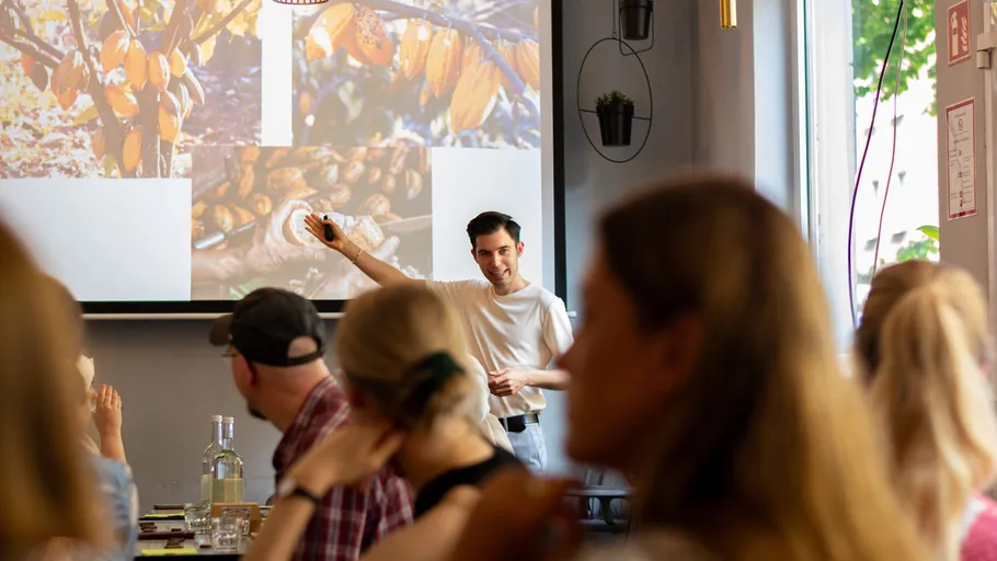 Man gives presentation to attentive audience.