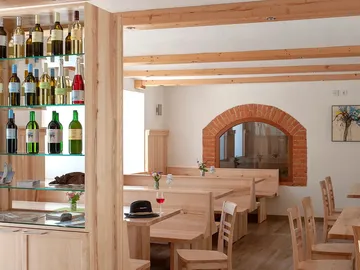 Wooden rack with wines, in a stylish restaurant.