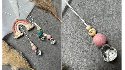 Colorful textile ornaments on grey surface.