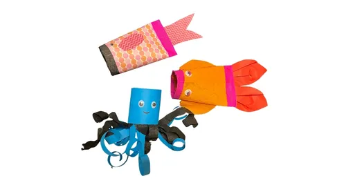 Colorful paper fish crafts on white background.