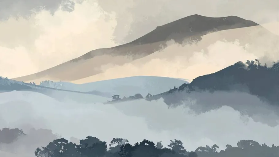 Misty mountains with layered fog and trees.