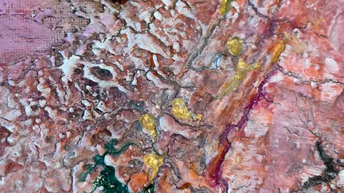 Abstract painting with pink, gold, and green textures.