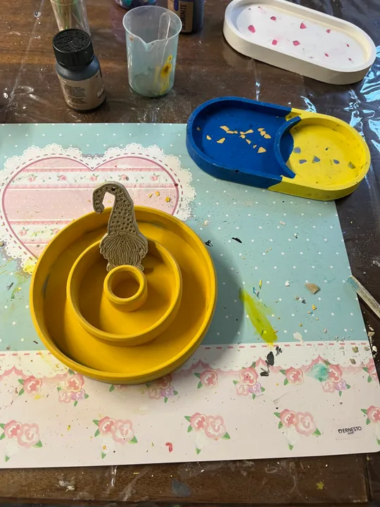 Crafting tools on a decorated table.