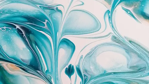 Abstract blue swirls on a canvas.