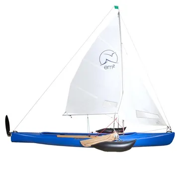 Blue sailboat with white sails on display.