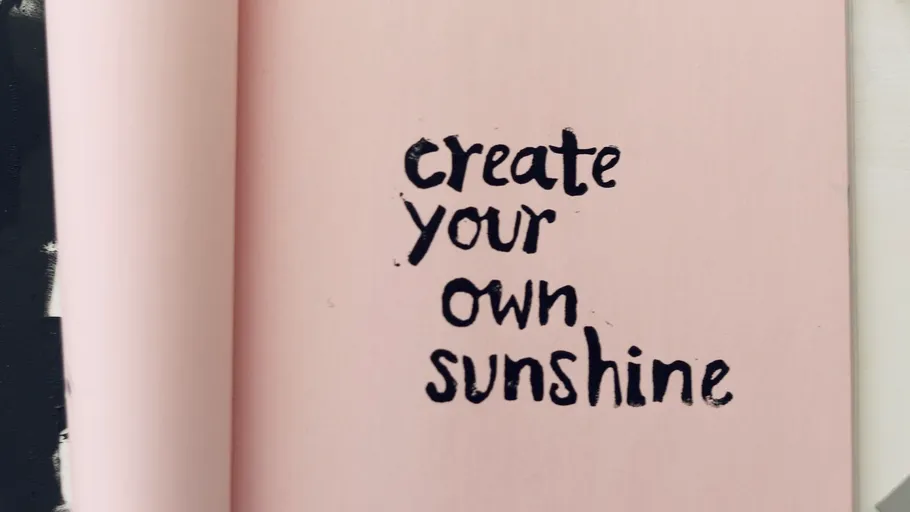 Book page with motivational text.