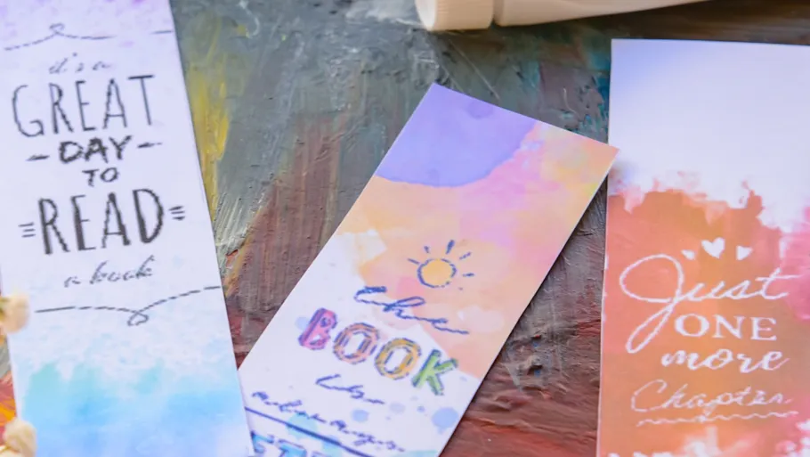 Colorful bookmarks on artistic background.