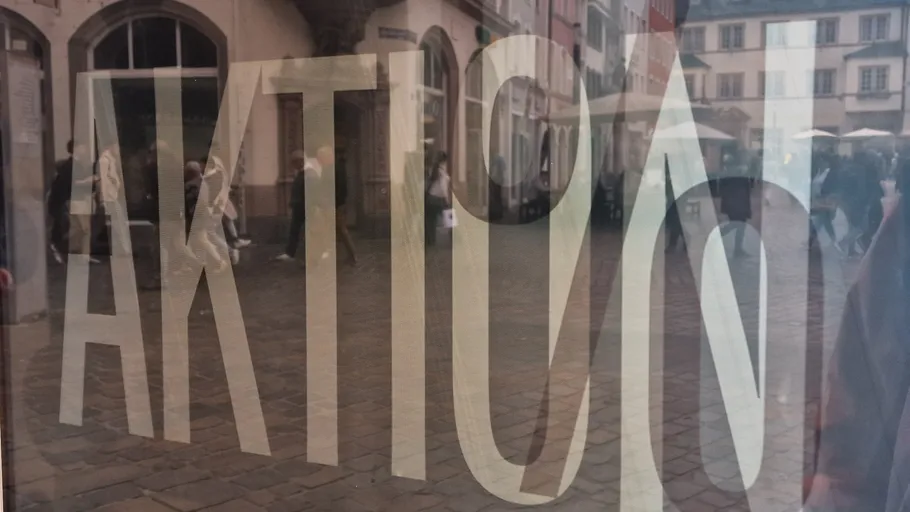 Reflection of street scene through glass window.