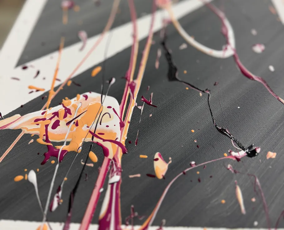 Abstract painting with colorful paint drips.