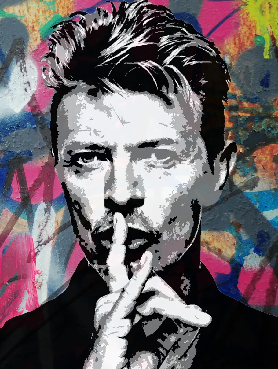 Person with finger on lips, colorful background.