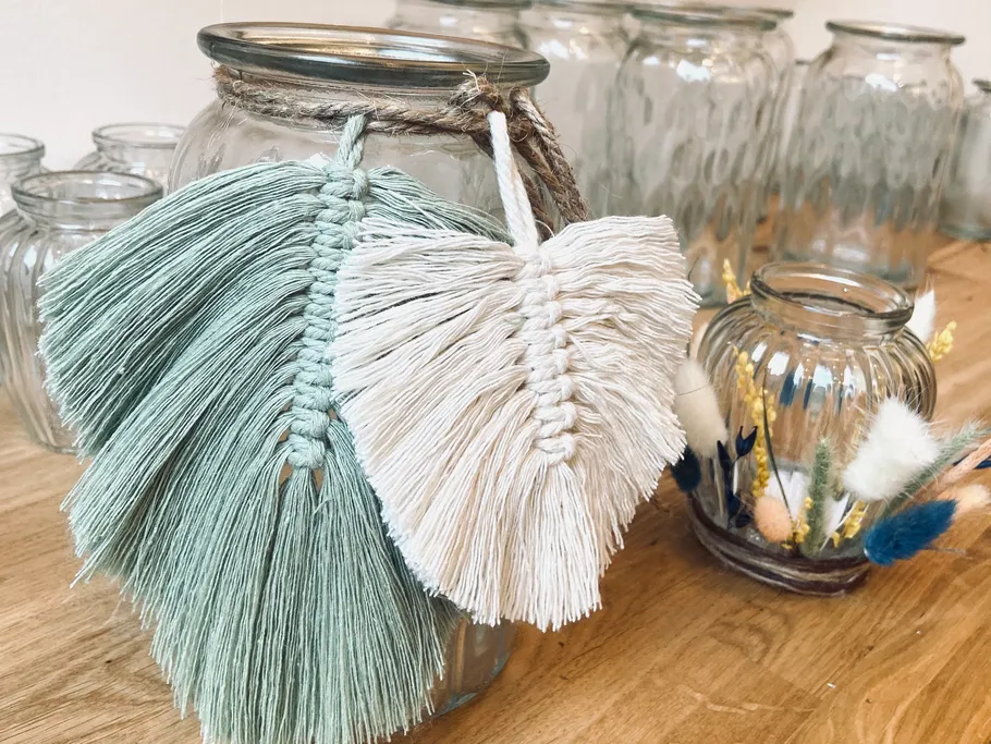 Macrame leaf decor on glass jars.