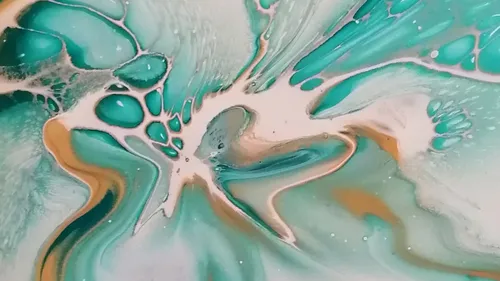Abstract turquoise and white fluid art.