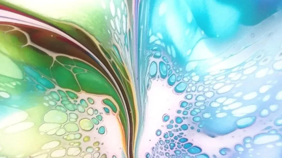 Abstract fluid art with swirling colors.