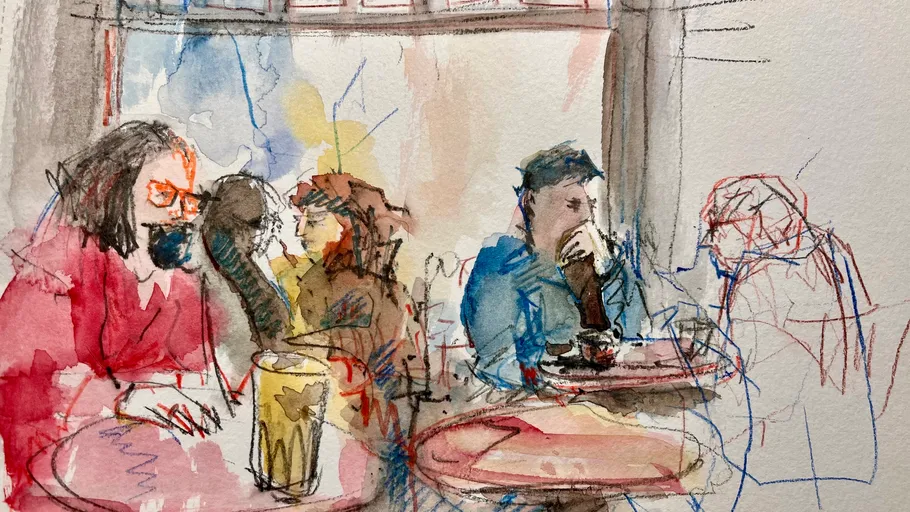 People conversing in a colorful cafe scene.