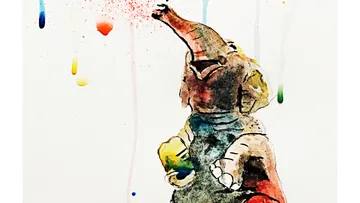 Elefant sprüht bunte Farbe auf Leinwand.