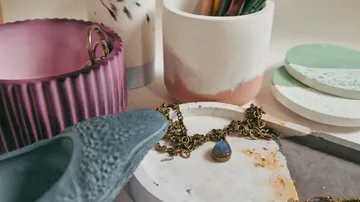 Jewelry and decor items on a table.