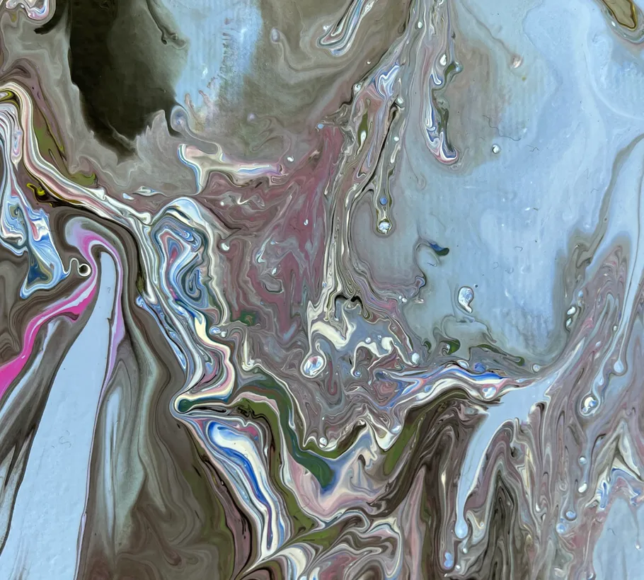 Swirling abstract multicolor paint pattern.