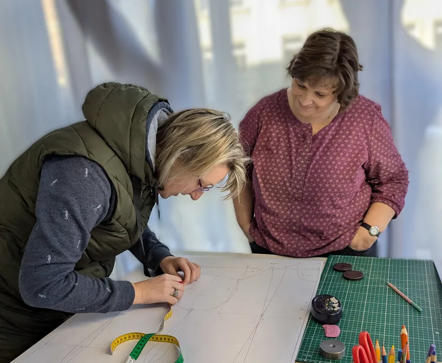 Two people working on a design project.