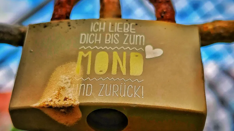 Lock with romantic German inscription outdoors.